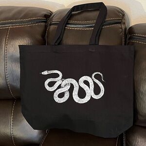 Elegant Black Tote with Snake Motif